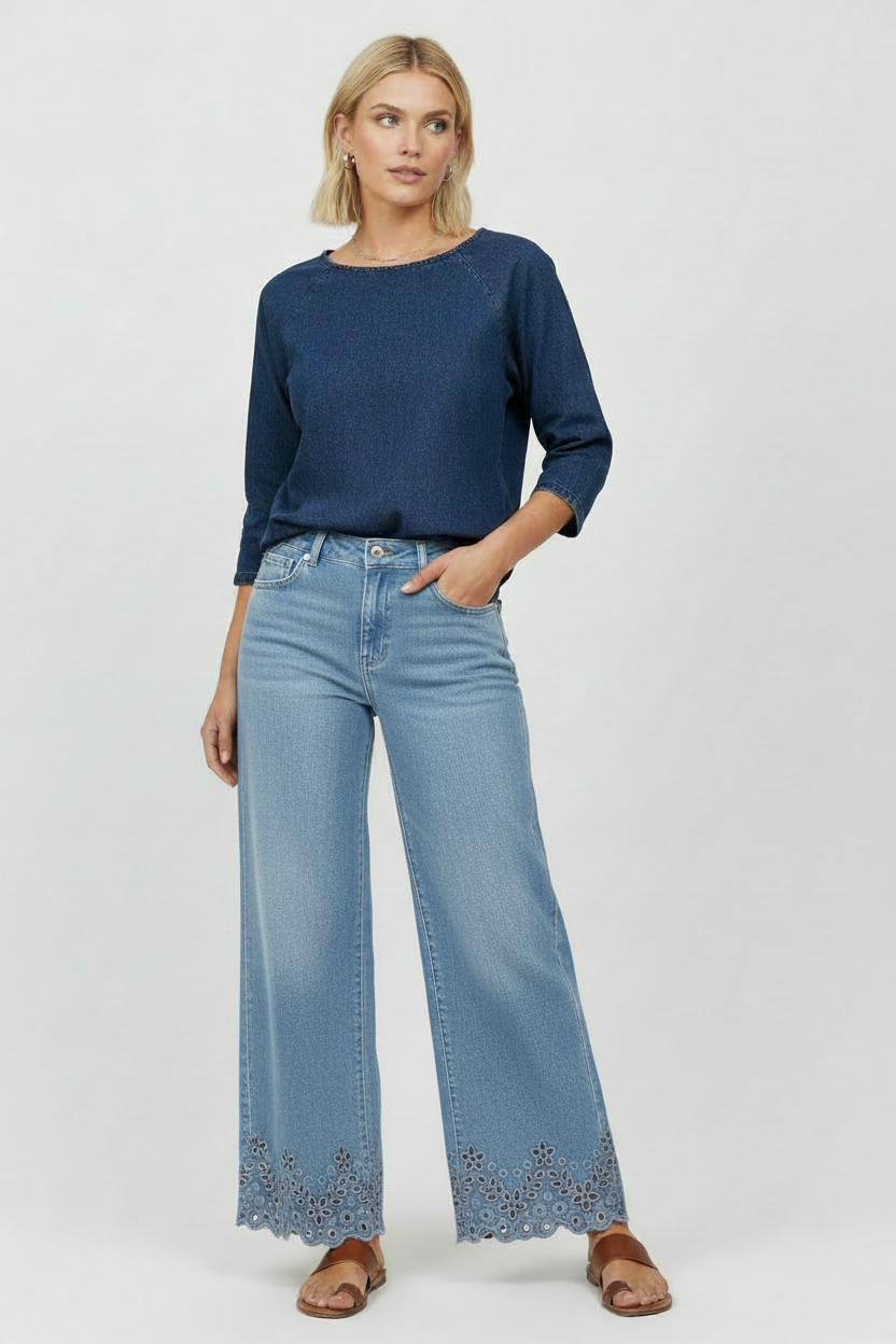 Ljusare denim blå wide-leg jeans med brodyr