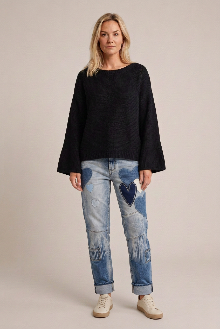 Slät framsida med hjärtjeans och sneakers