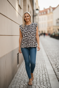 Vit leopardtopp blå jeans